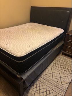Queen bed with mattress  included