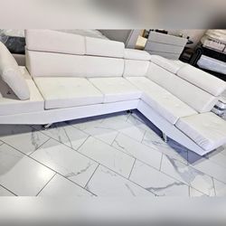 White Faux Leather sectional sofa with head rests