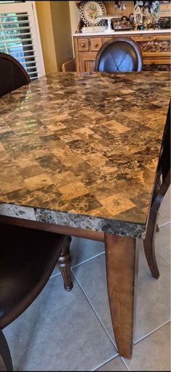 Granite table/real wood/leather chairs