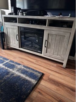 Entertainment stand with fireplace