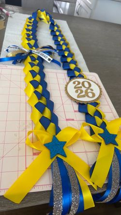 Yellow blue graduation leis