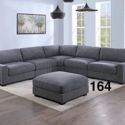 GREY CORDUROY SECTIONAL WITH OTTOMAN 