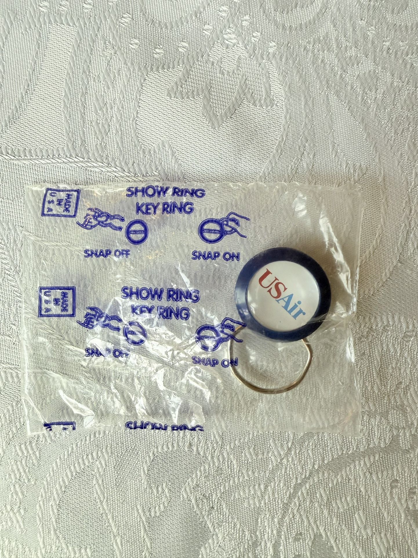 US Air Airlines Vintage Snap Key Ring. 1980s Original Very Hard to Find. Never used. Still sealed in original packaging.