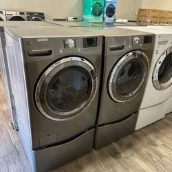 Kenmore elite stainless steel Frontload washer and dryer set electric with warranty