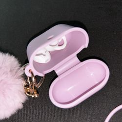 silicone case for AirPods Pro with a fluffy pom-pom keychain