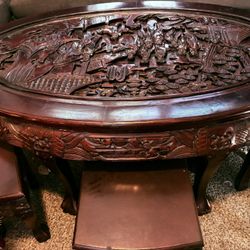 Vintage Hand Carved In The Philippines Coffee Table Has Six Little Stools That Slide Under It Also Hand Carved Out Of Mahogany Wood