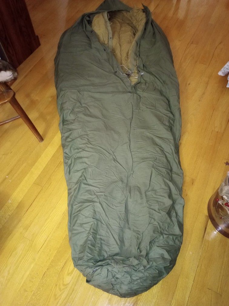 World War II Sleeping Bags And Raincap