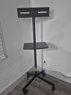 TV stand with wheels.