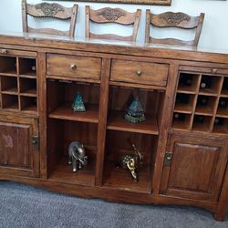 vintage bar with cutting boards wine racks and cabinets