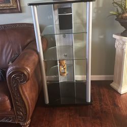 Three-tiered glass tv stand/shelf