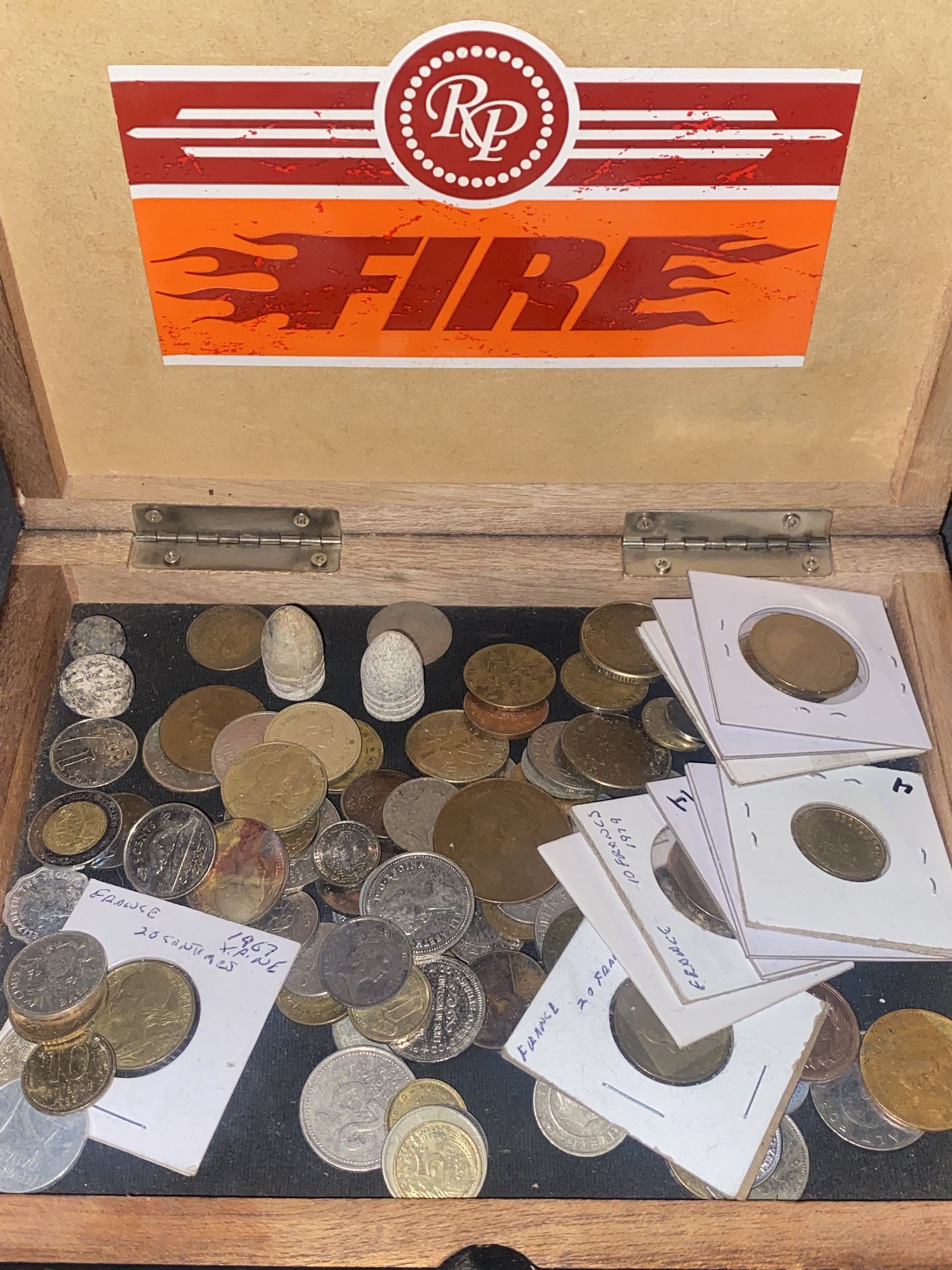 At least 200+4 coins from around the world and some souvenir air war items