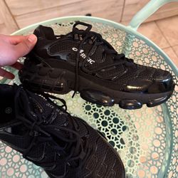 Black steel toe shoes.