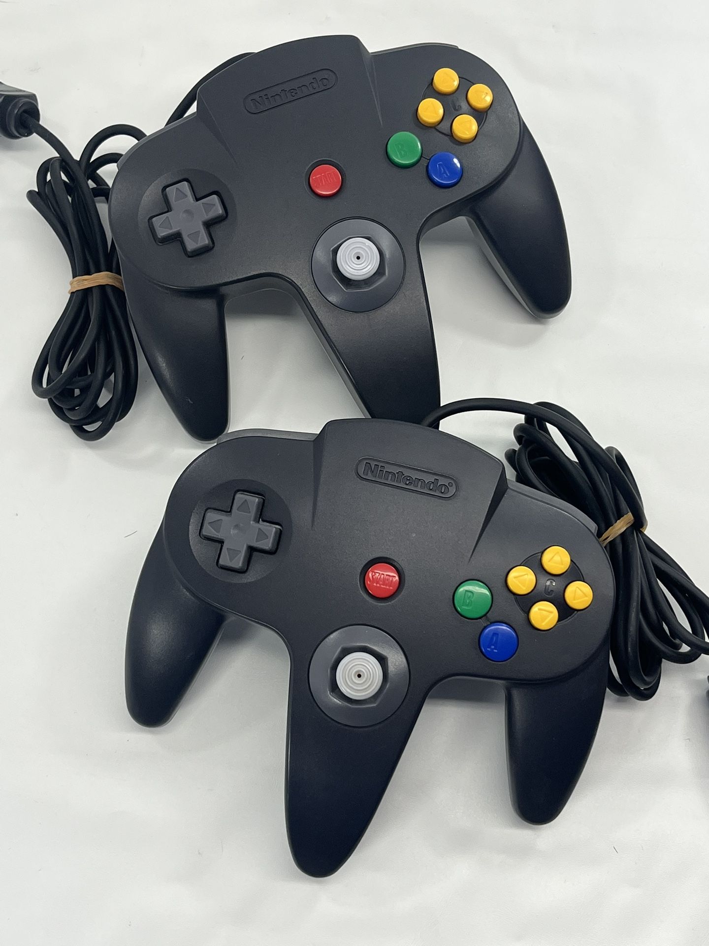 Two OEM Nintendo N64 Controllers Black/Gray NUS-005