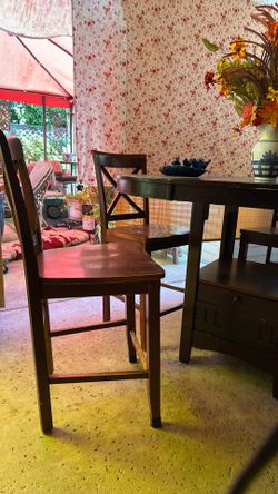 High dining table, 42" x 5' oval or can be made into a 42"round dining table