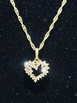 10k  yellow Gold  Diamond Chain and pendant