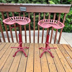 2 Red Metal Swivel Bar Stools
