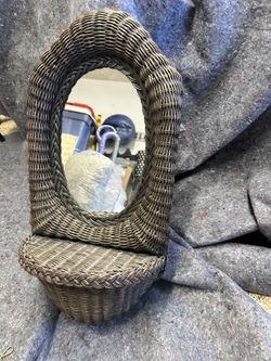 Cute vintage wicker wall mirror shelf