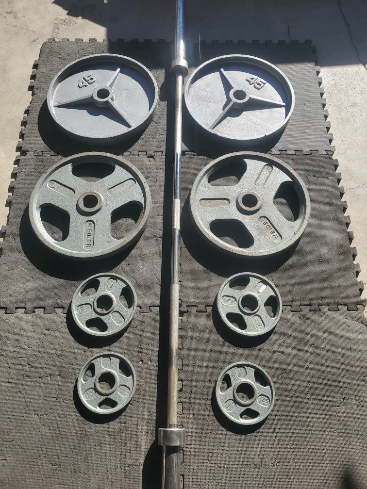 Olympic Weight Set Includes sold 7ft 45lb Olympic Bar 4x45lbs 2x5lbs 2x2½lbs That's 240lbs With bar