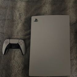 PlayStation 5 with controller