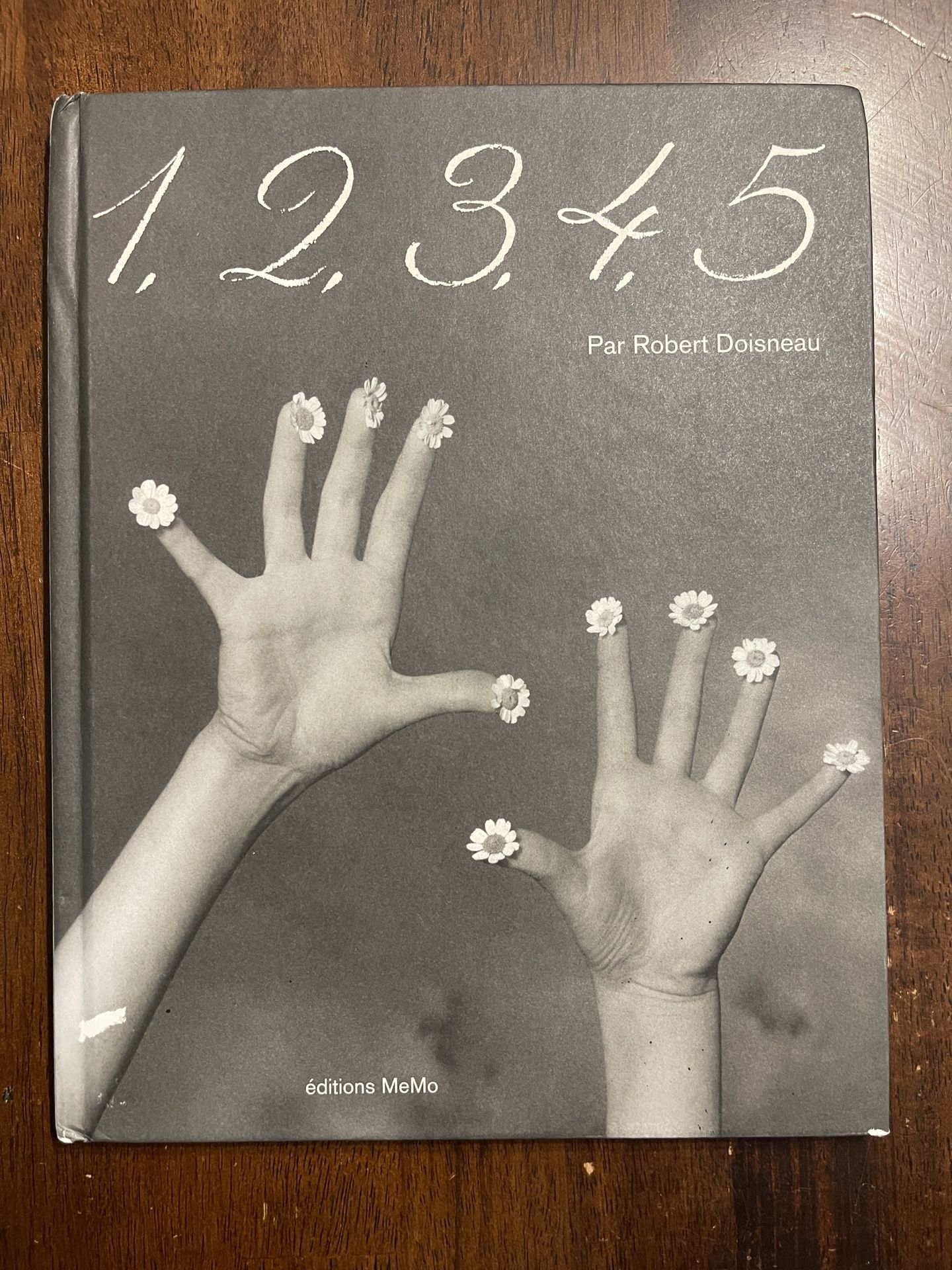 1, 2, 3, 4, 5 by acclaimed photographer Robert Doisneau, published by Éditions MeMo.