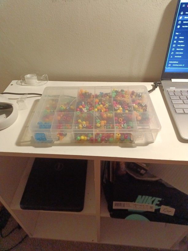 Unorganized Container Of Beads