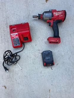 Milwaukee M18  FUEL ONE- KEY 18v lithium-Ion impact 1/2” comes with battery/charger asking $325