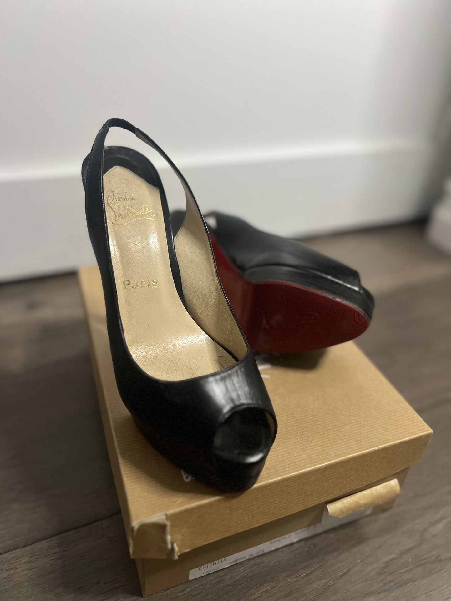 Christian Louboutin black leather sling back 