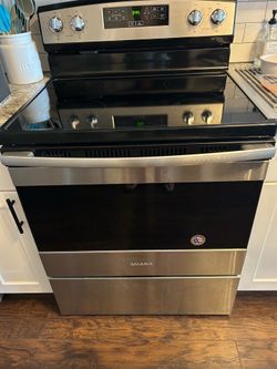 Amana Electric Range.
