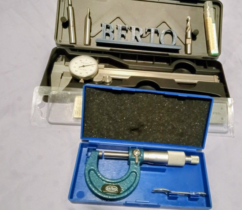 Manual Caliper,  3 End Mills, Manual Micrometer, And Free Empire Ruler