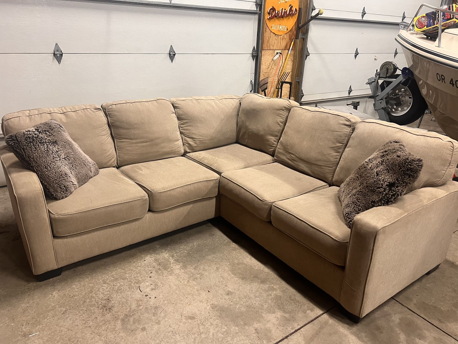 Ashley’s Tan Sectional Sofa