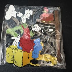 Adorable Disney Fantasy Goofy waiting for a hen's egg to fry