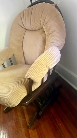 Glider rocking chair.