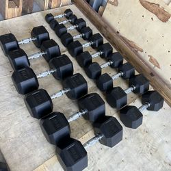New pair of 5,10,15,20,25,30,45 and 50lb rubber dumbbells  NEW IN BOX $400