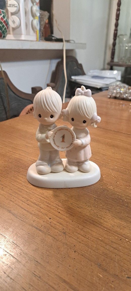 Precious Moments Collectible Figurine Hand Painted Bisque Porcelain, " God Blessed Our Year Together With So Much Love And Happiness " 1983