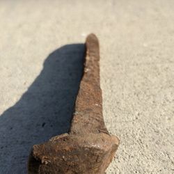 Four Rusty Train Track Nails