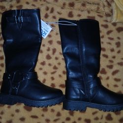 Brand new black leather zip up boots for little girl. Size 11. $10 (Cash only)