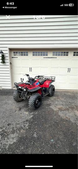 Red Kawasaki ATV 1997 300cc