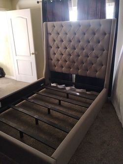 Queen size bed frame. Grey color