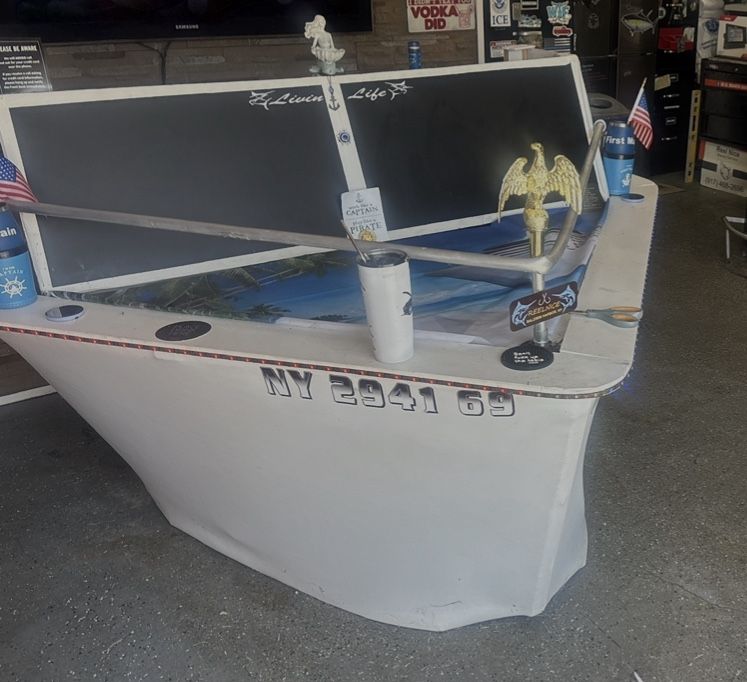 This is a custom Rolling boat bar that was designed to be easily Movable and will fit through a standard door height . One person setup on wheels. Al