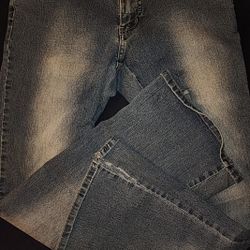 Acid Blue size 6, denim blue jeans. 70% cotton, 26% poly, 4% spandex. East or west