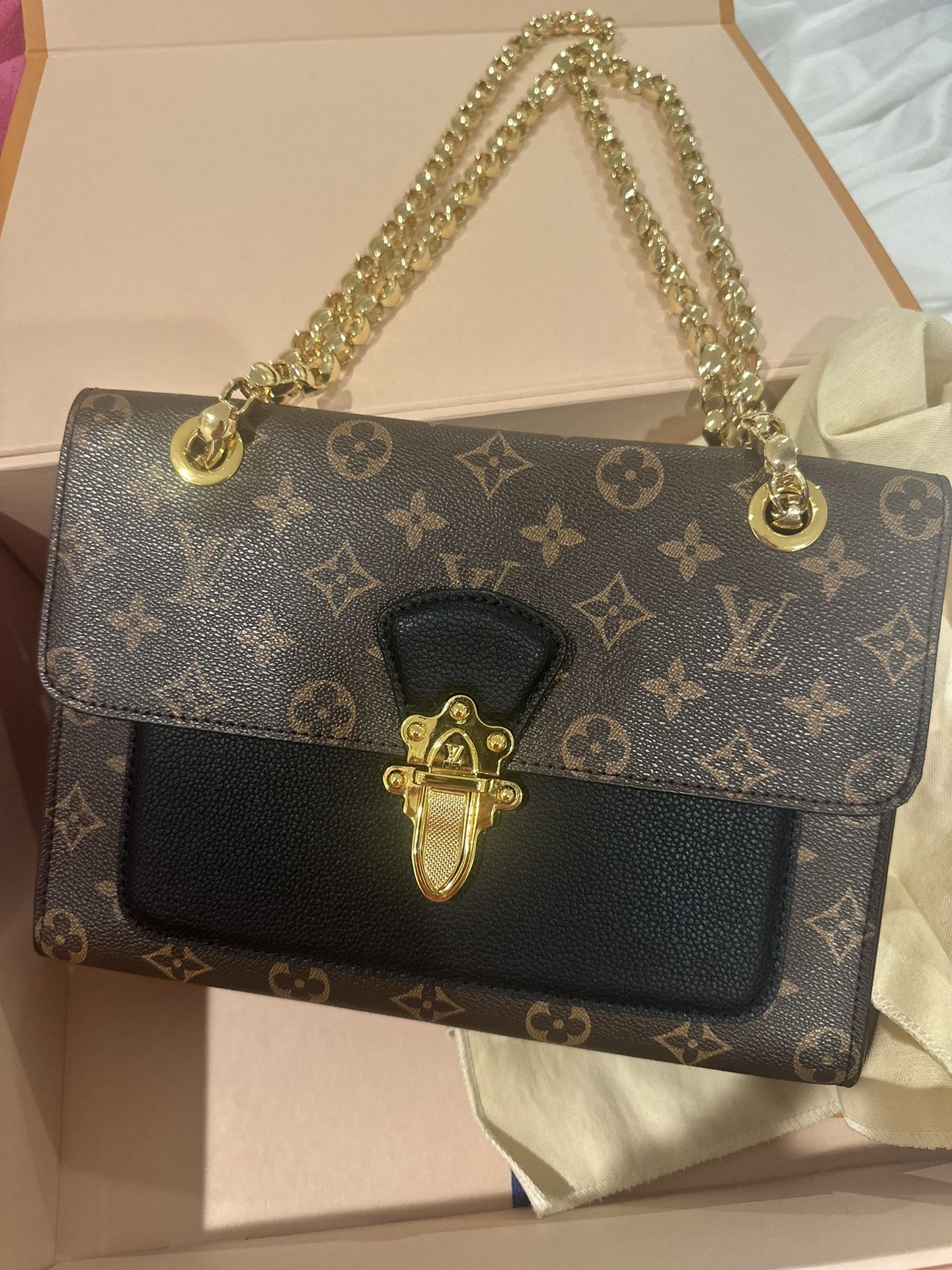 Louis Vuitton Monogram Canvas & Black Leather Victoire Bag