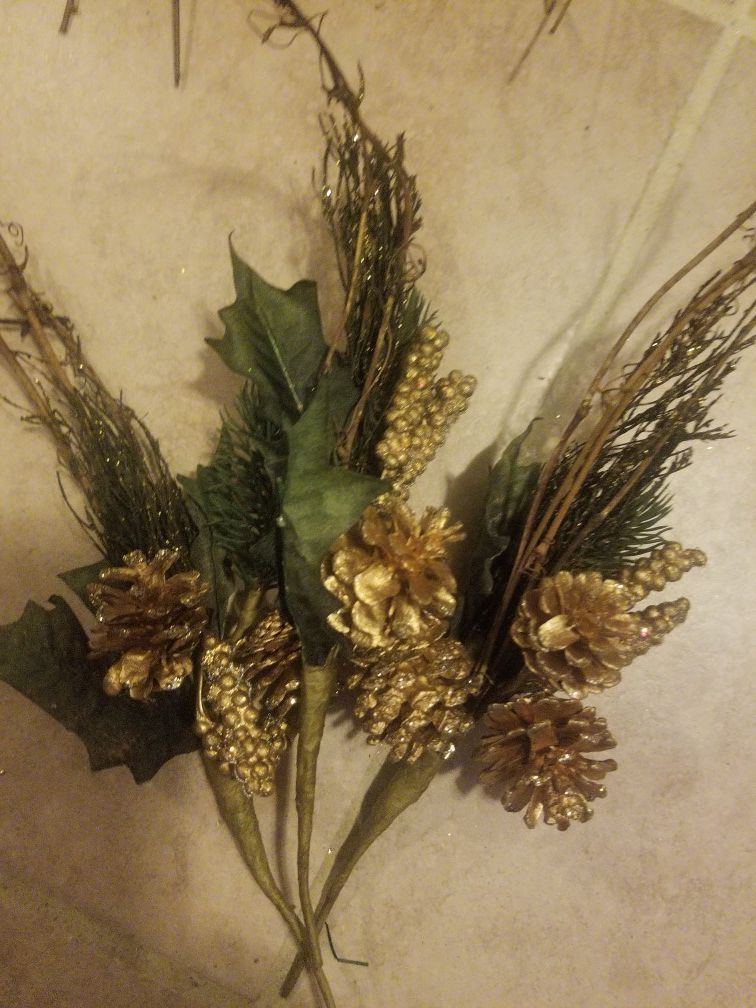 Golden branches with golden acorns with greenery