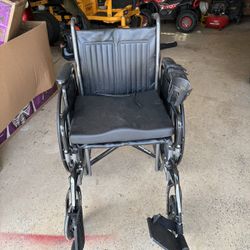 Wheel Chair with padded seat and cup holder 