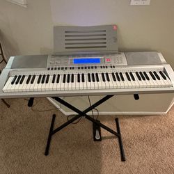 Casio WK-210 76-Key Workstation Piano Keyboard - With Piano Stand, Music Stand, Power supply, And Pedal Included