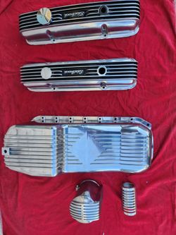 SBC vintage finned edelbrock valve covers oil pan oil filter cover and coil cover brand new.
