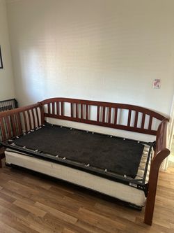 Day bed with trundle plus two twin mattresses