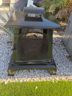 Sunnydaze Pagoda Style Steel Outdoor Fireplace/ fire pit