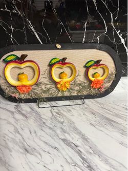 vintage wooden wall ceramic apples