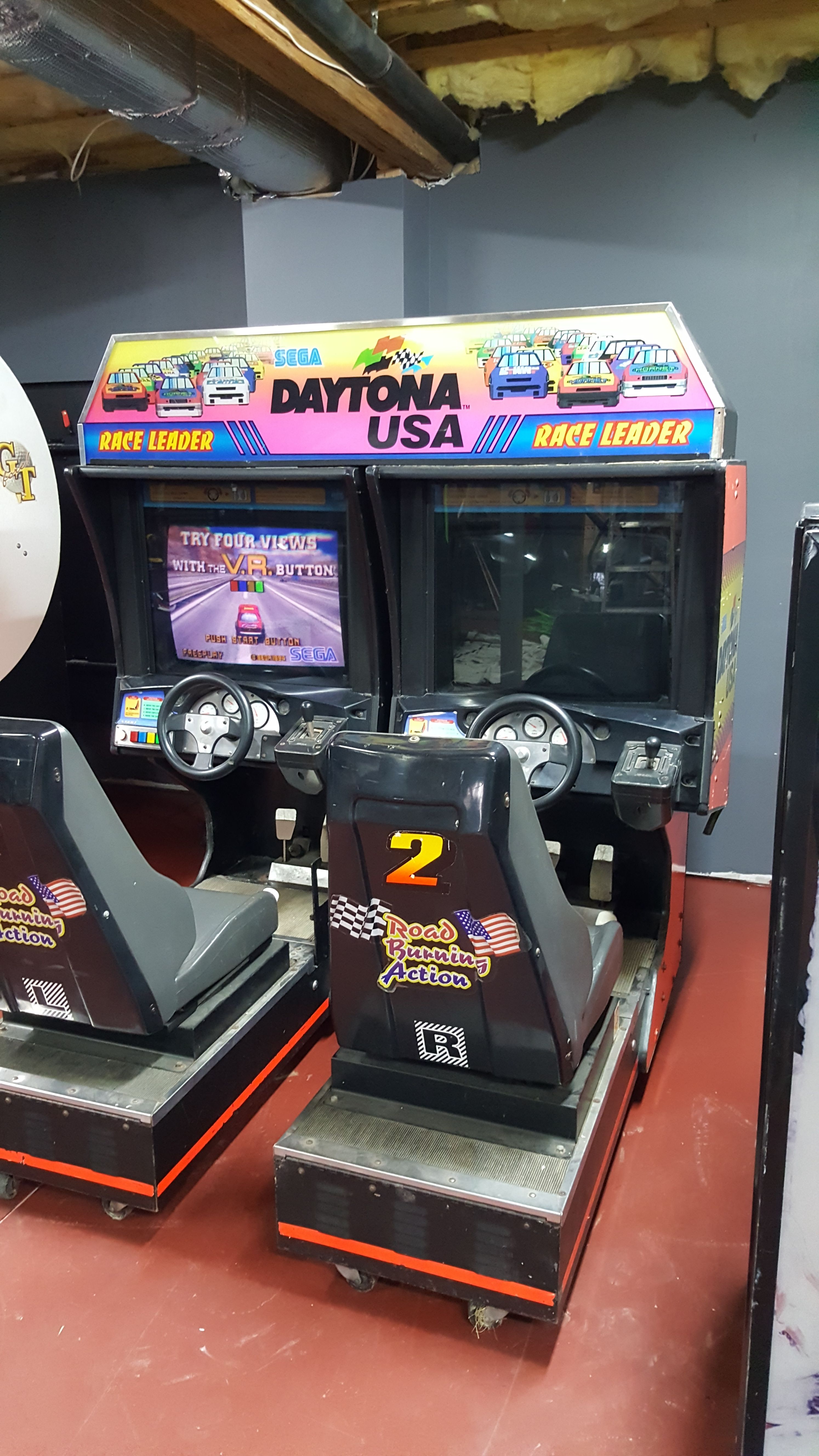 Daytona USA driving arcade machine