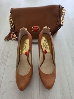 Michael Kors Leather Bag & Matching Shoes In Excellent Condition. Color Terra Cotta & Gold Accents. Paid $160 for bag & $60 for shoes. Shoe Size 7.5
